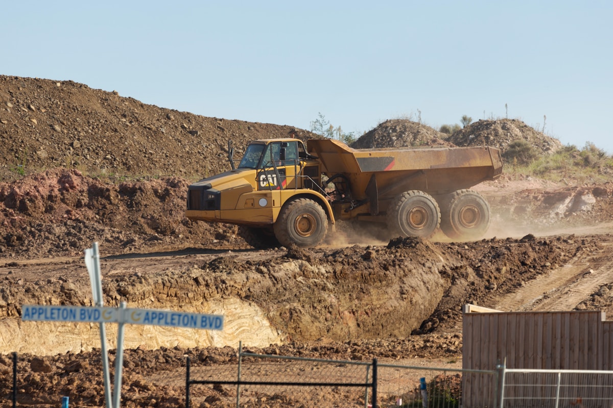 Dump trailer rental at a Utah County job site ready for loading